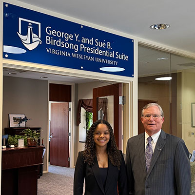 President Miller with current graduate intern Maya Nathaniel '27.
